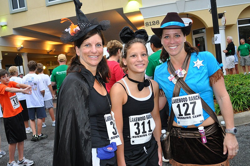 Julie Santiago, with her daughter, Jillian, and friend, Bethany Lynch, dressed up for the race.