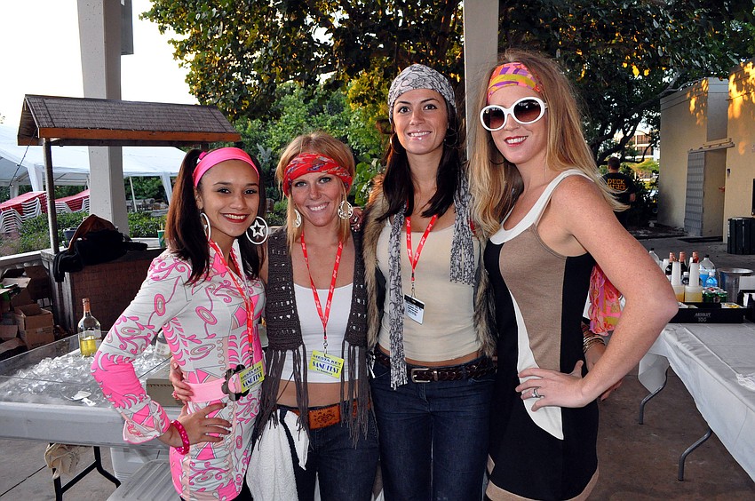 Seana Doyle, Stacy Gonzalez, Samantha Coyle and Rachel Matthes worked the bar in their 1970s attire.
