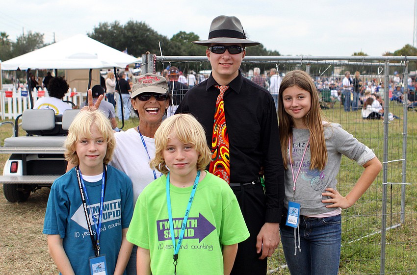 Vaughan Heaps, 10, Barbara Strauss, Lennon Heaps, 10, Mike Imbasciani and Shelby Price, 10, pose together at the 21st annual Sarasota Blues Fest, Saturday, Nov. 5, out by Ed Smith Stadium.