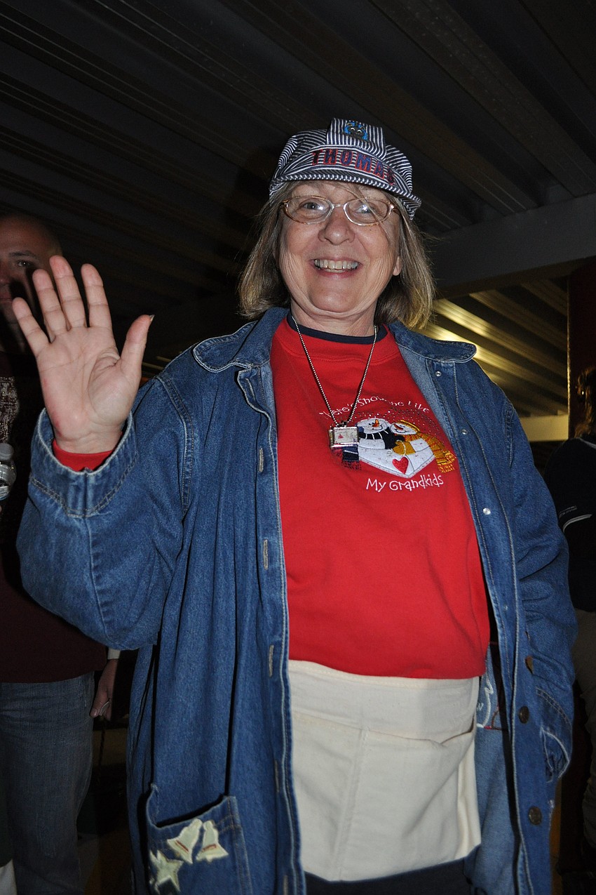 Braden River teacher Dr. Donna Hart ushered children onto the train.