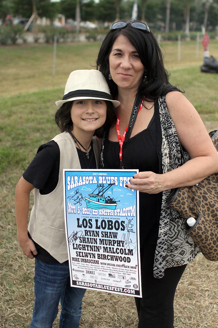 Alex Shaw poses with his mom, Charlene. Shaw opened for Mike Imbasciani at the 21st annual Sarasota Blues Fest, Saturday, Nov. 5, out by Ed Smith Stadium.