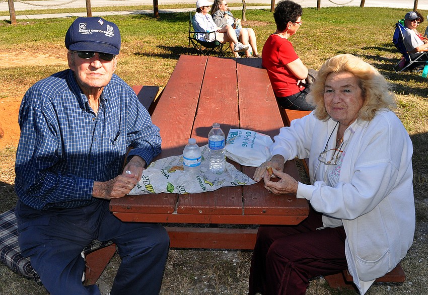 Eugene and Grace Jackson enjoy their picnic lunch while listening to one of the bands play inside the Turtle Beach pavilion.