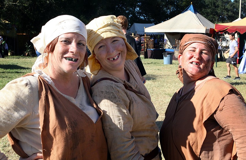 Tara Connelly, Katelyn Bowman and Tina McKinnis were some of the peasant women who wandered around, Sunday, Nov. 13, at the Sarasota Medieval Fair.