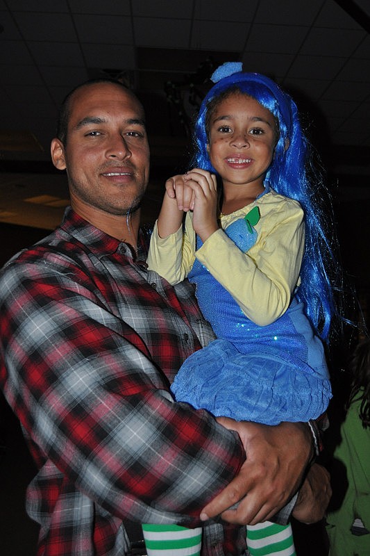 Ben Morgan gave his daughter, Mia, a better spot from which to watch the costume contest.