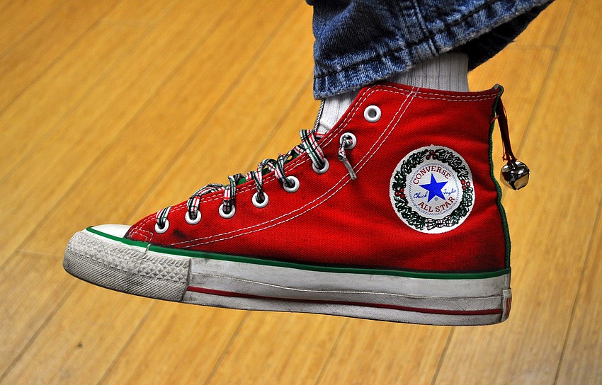 John Wisz shows off his Christmas Converse All-Stars.