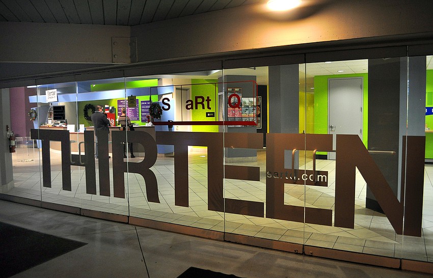 The G Wiz doors advertise the artistic exhibit located inside their building. The exhibit will run from Dec. 9, 2011 through Jan. 7, 2012.