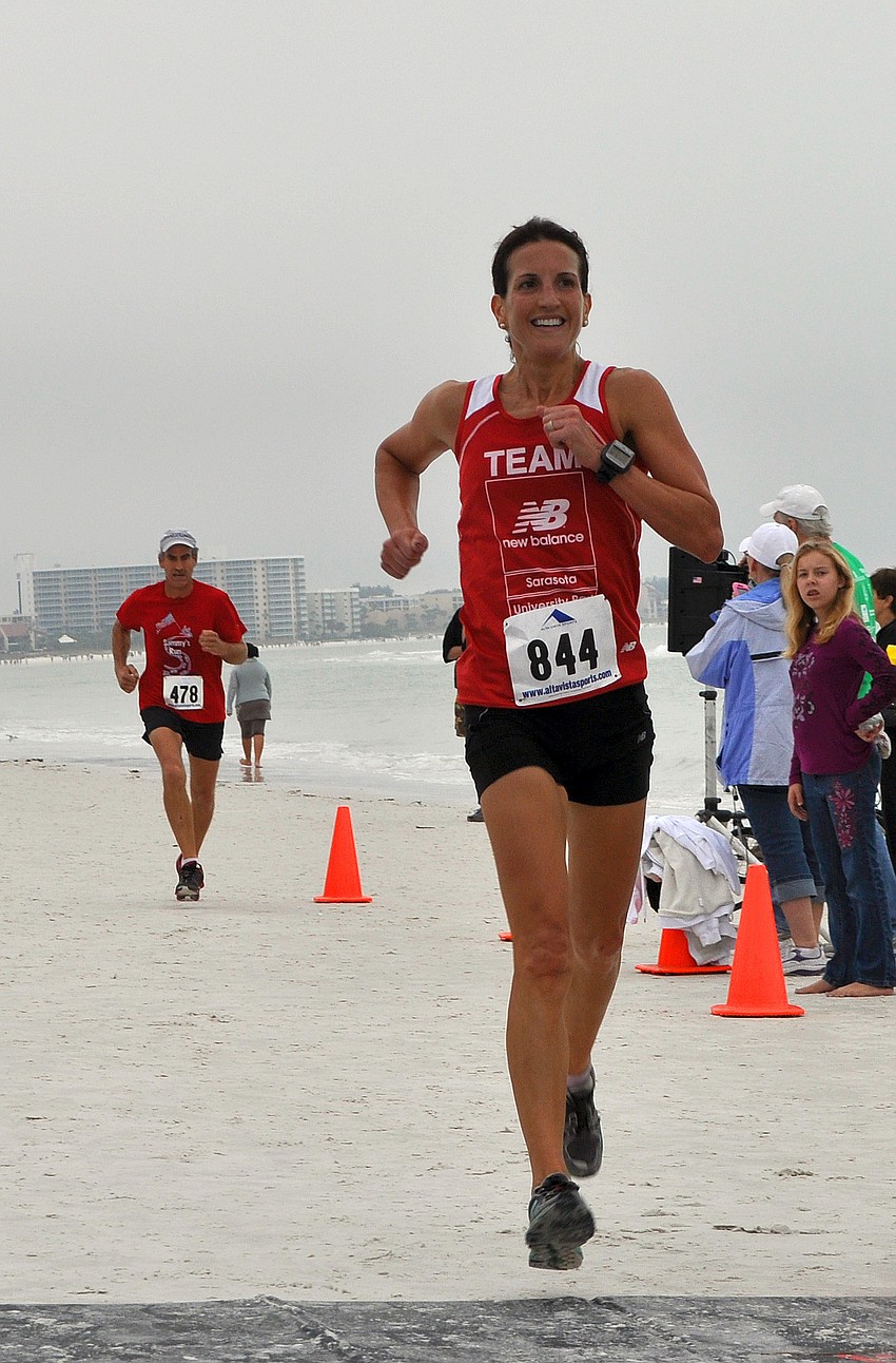Rachel Chambers of Sarasota was the first woman to finish the 5K