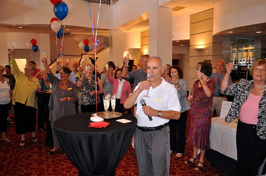 Murray Sherry led the Friends of the Sarasota Ballet in a toast.