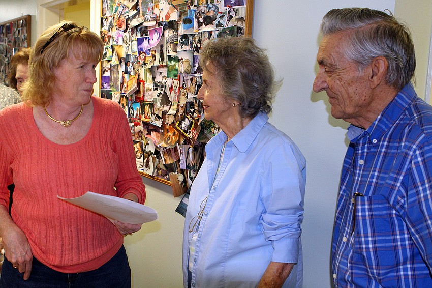 Dr. Janet Whitlock talks with Marilyn Rhein and Gaige Walters  Thursday, Oct. 20 inside the hospital. Walters sold the property to Whitlock a little over 30 years ago and wanted to show her the documentation he had kept on the sale.