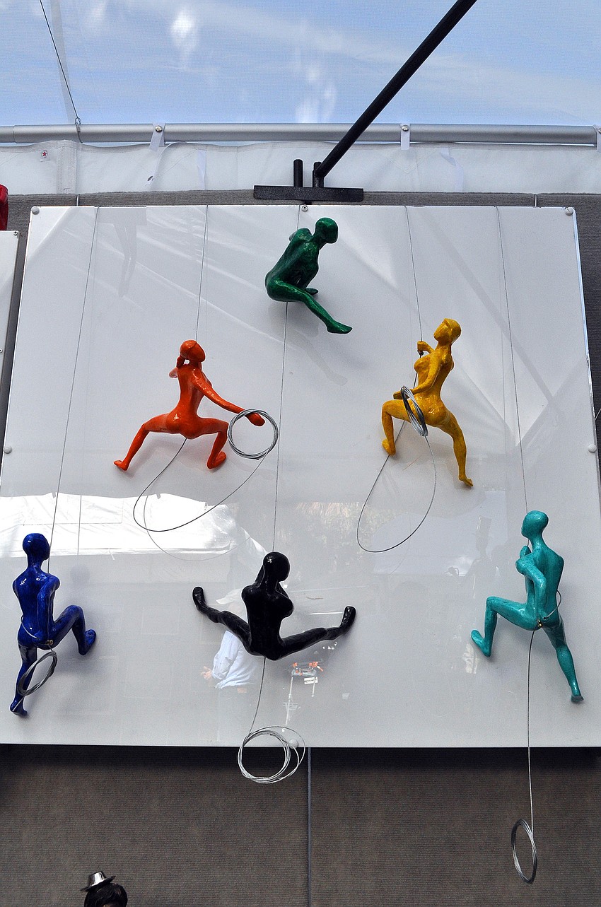 These colorful climbers caught the attention of many people who visited Ancizar Marin's tent.