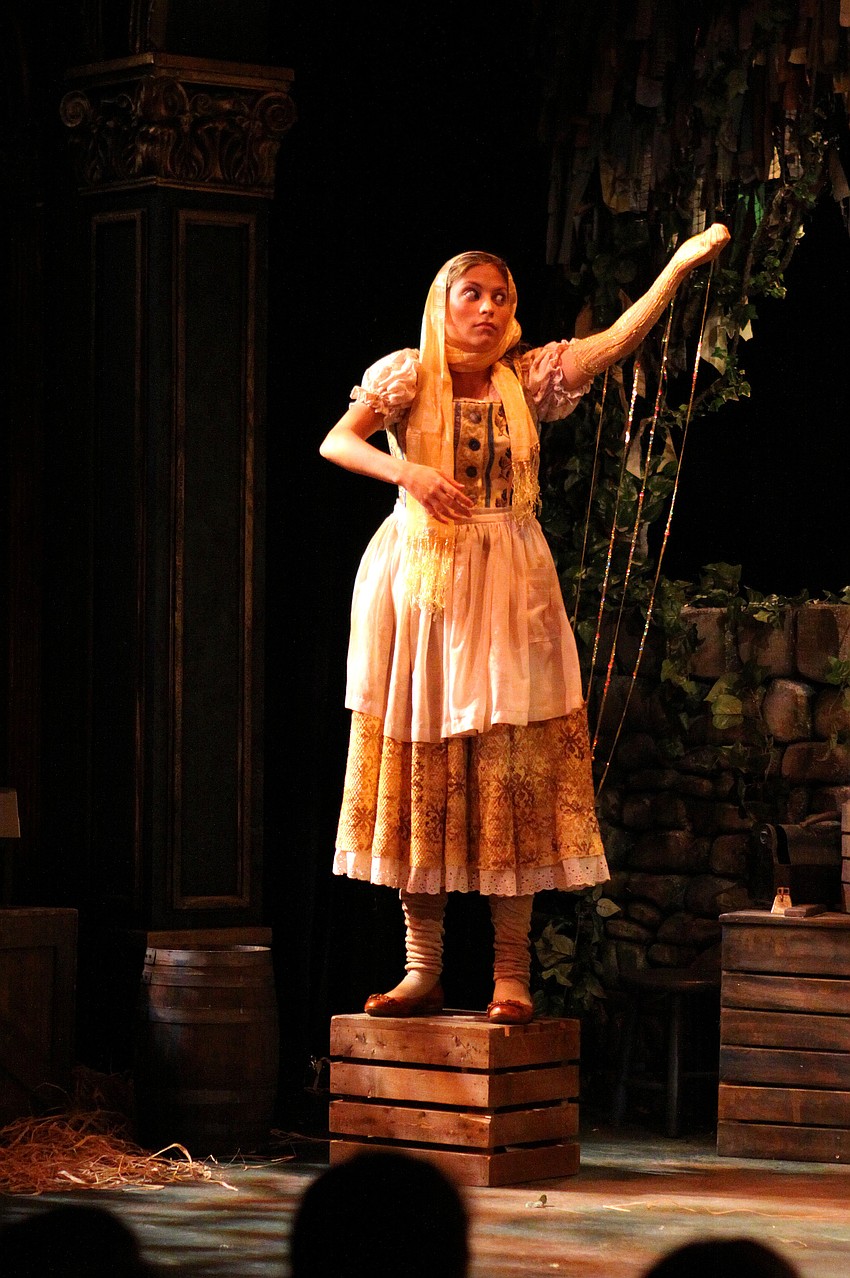 The golden harp, Sarah DeStefano, tries to get Jackâ€™s attention during Florida Studio Theatreâ€™s â€œJack and the Enchanted Beanstalkâ€ Tuesday, Sept. 27 at the Gompertz Theatre.