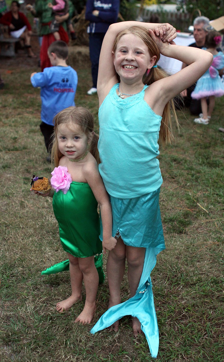 Ava, 4, and Zoe, 8, Schroeder dressed up as mermaids.