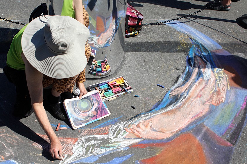 Kitty Dyble Thompson works on a catoptic piece.