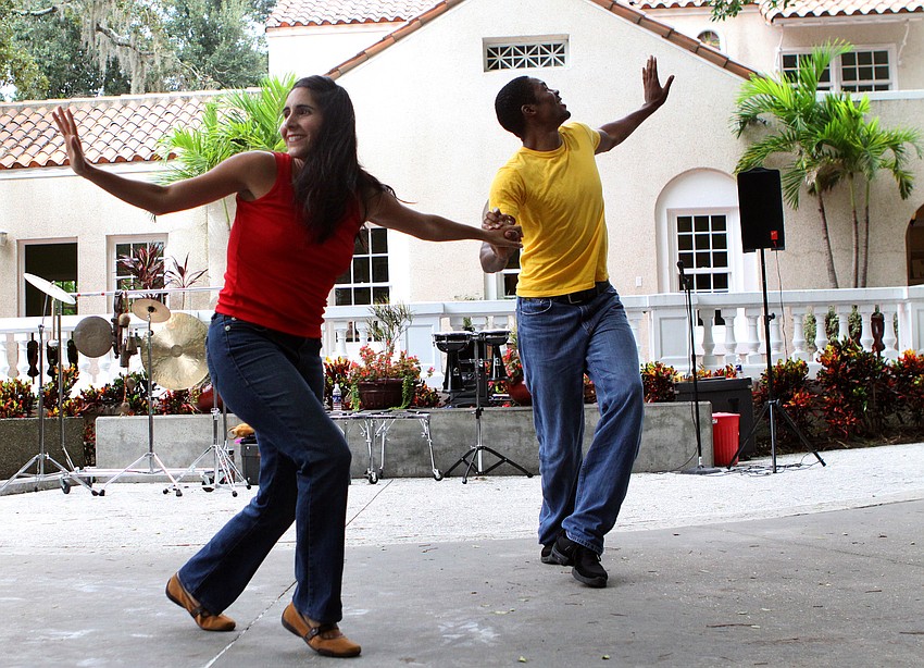 Leymis Bolanos Wilmott and Jahrel Thompson dance together during the 