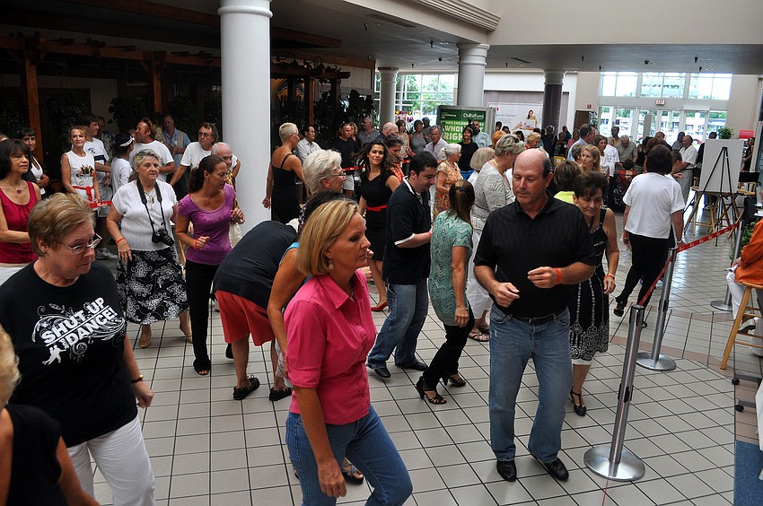 People from the crowd joined the professionals for a few group dances including the â€œElectric Slideâ€ and the â€œCha Cha Slideâ€.