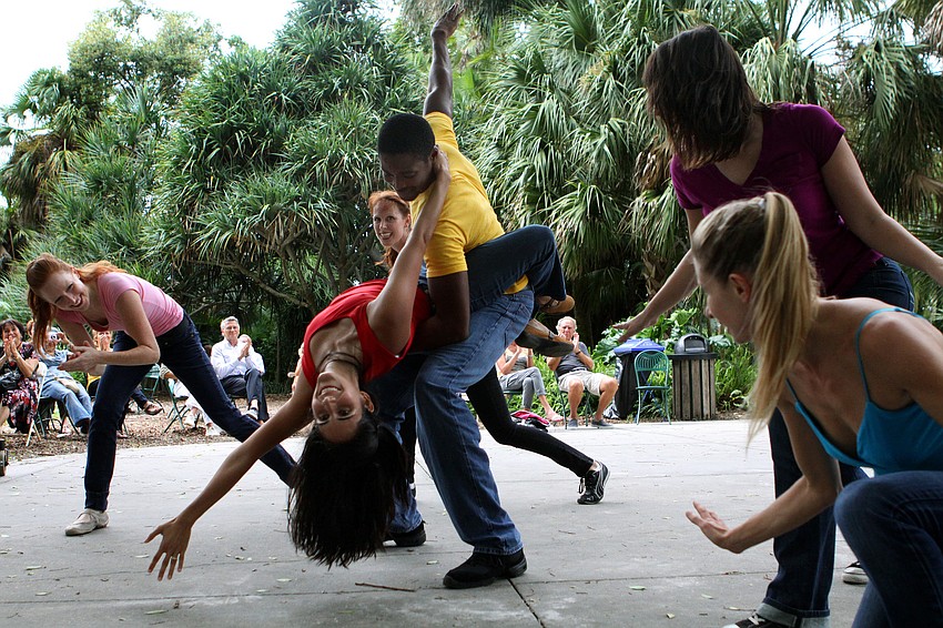 The entire ensemble from Fuzion Dance Artists take their final pose during the 
