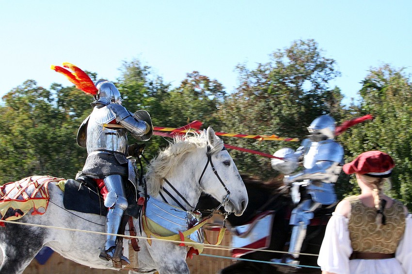 Two jousters attack one another during the jousting competition, Sunday, Nov. 13, at the Sarasota Medieval Fair.