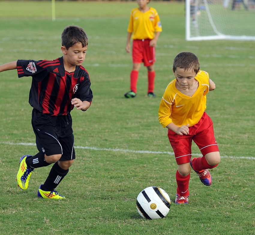 Clearwater Chargers forward Brendan Krueger races past the Boynton Beach Nightsâ€™ Bradley Espinosa.