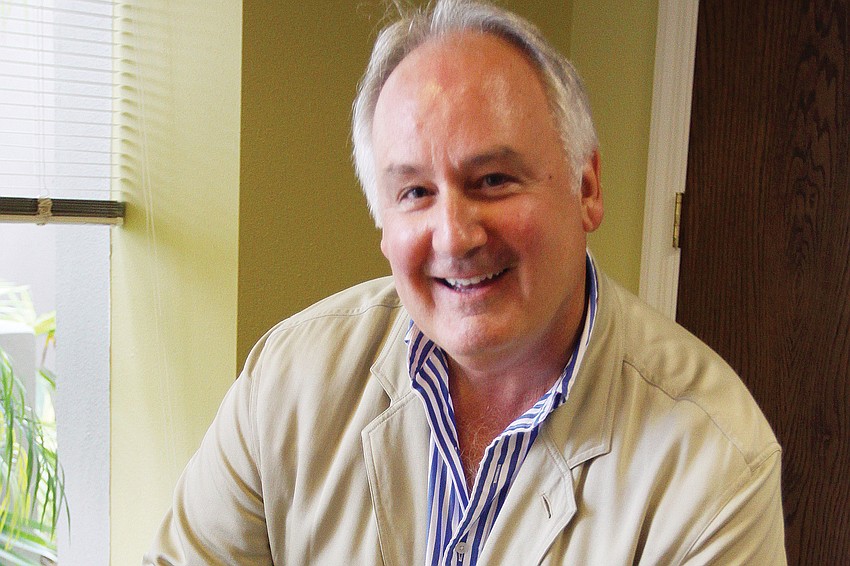 Longboat Key, Lido Key, St. Armands Key Chamber of Commerce President Tom Aposporos makes martinis.