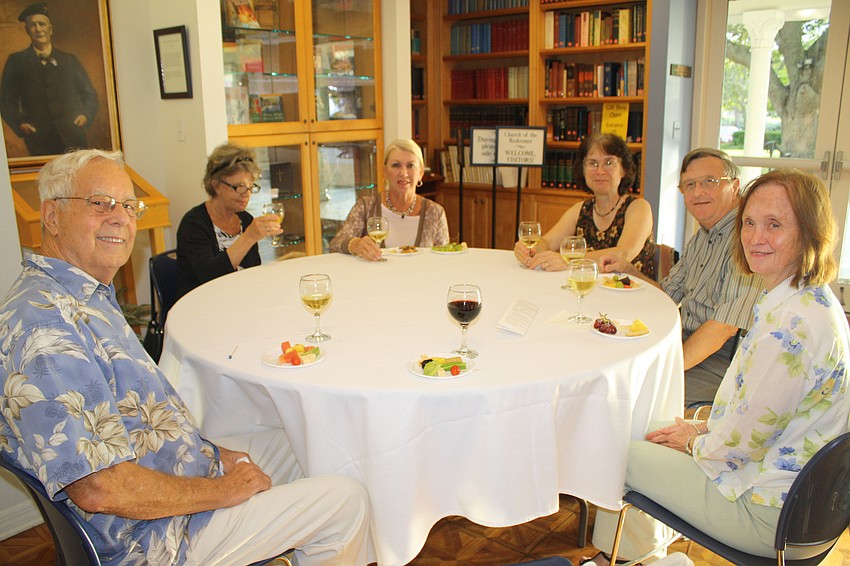 Carl Benninghoff, Julie Callel, Sheri Darling, Laura and Dave Hardenburgh and Janet Short enjoy the festivities during the kick-off reception for the month-long celebration of the 400th anniversary of the King James' Bible.