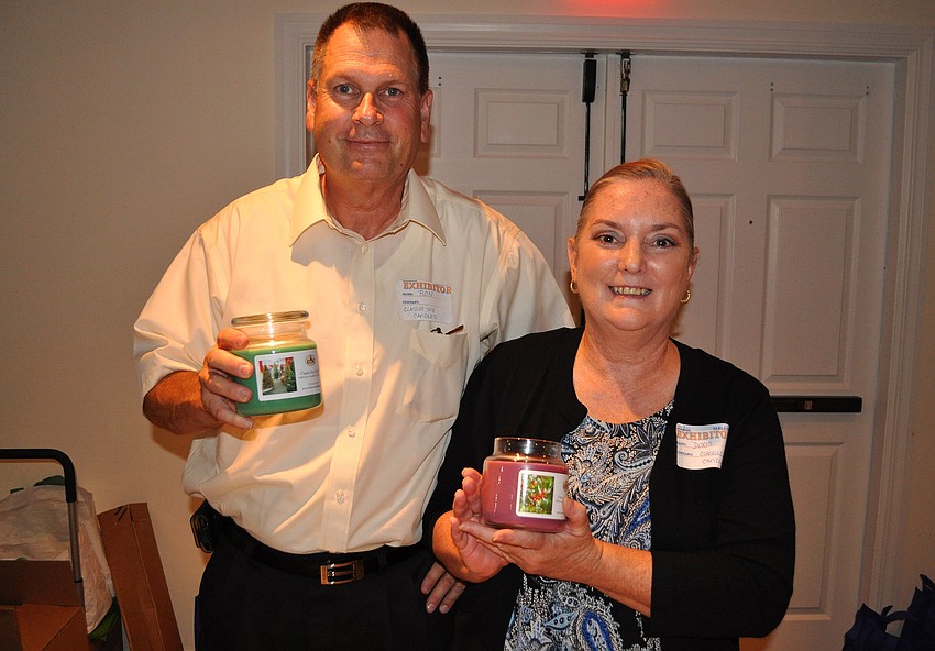 Ron and Doris Bognar show off their soy candles.