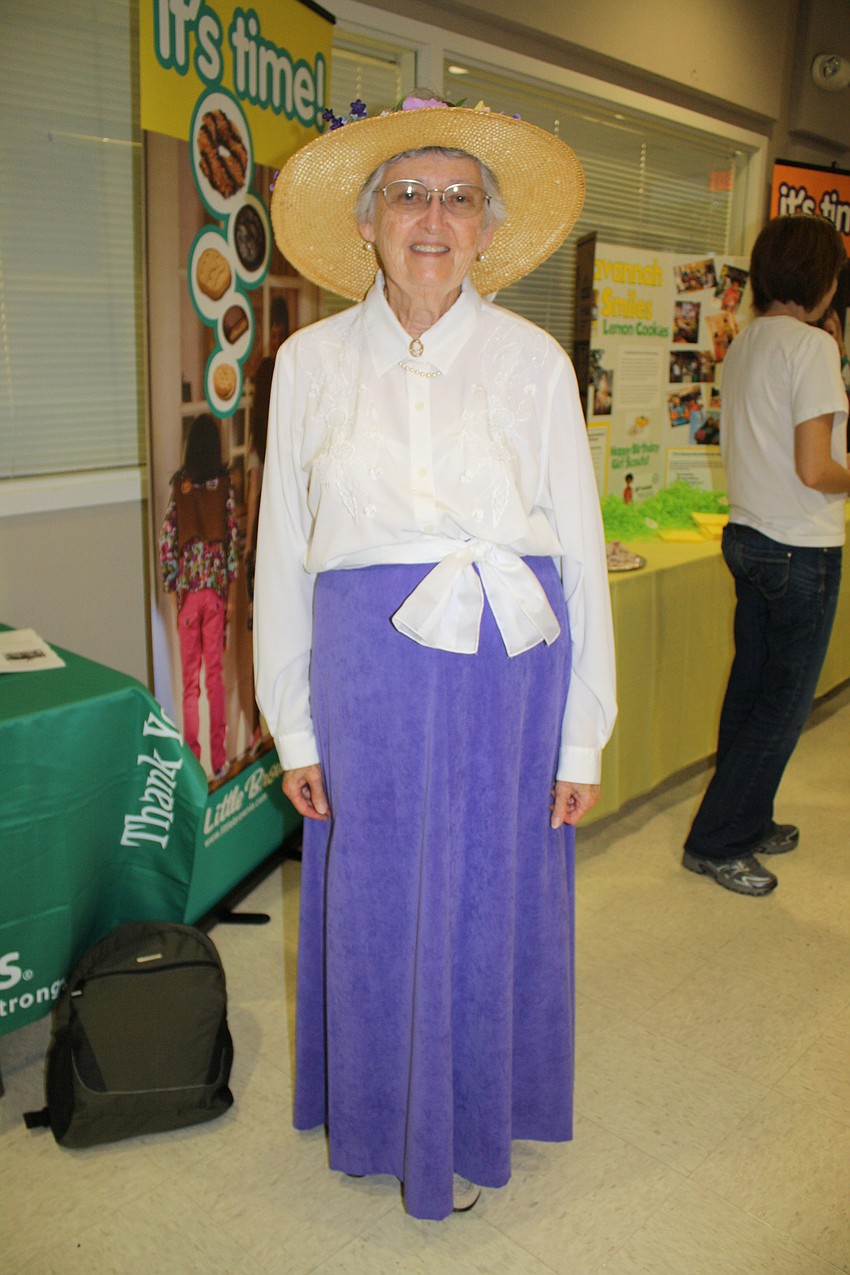 Julia Forkgen dresses as Juliette Lowe, the founder of Girl Scouts. The Girl Scouts were founded in 1912.