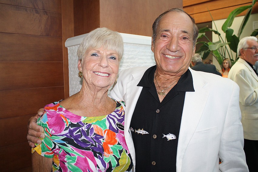 Sue and Herb Berman pose for a photo.