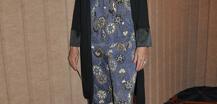 Debi Chapman wearing Soma Intimatesâ€™ Cool Nights-Boho Chic Sleep Cami Top and Easy Pant in Heron Blue.