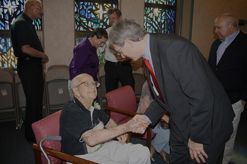 Jim Brown and Executive Editor of the Herald Tribune Mike Connelly