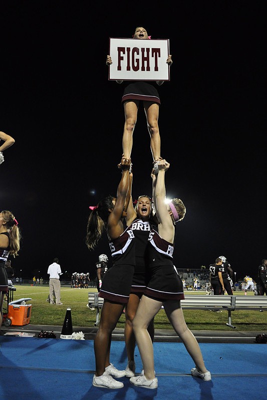 Varsity cheerleaders led the crowd in cheers.