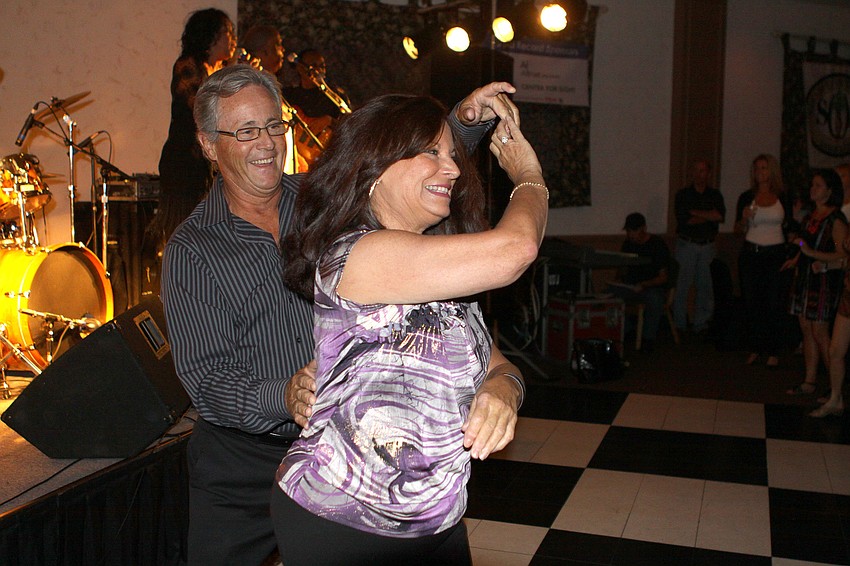 Vinnie Algozino spins Joyce Donahue as they danced together to the Soul Sensations.