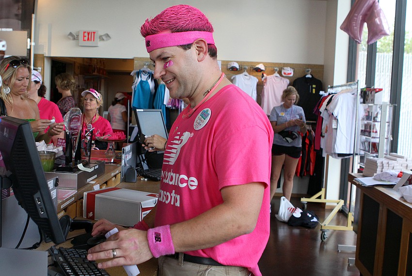 Garrett Amadon was dressed from head-to-toe in pink while he checked out shoppers inside New Balance Sarasota.
