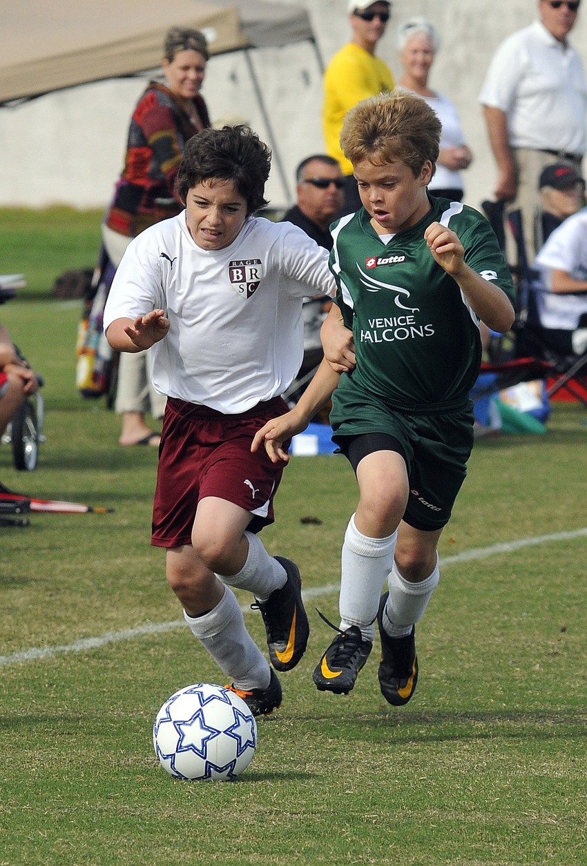 Twelve-year-old Mason Fischer brings the ball up the field during Braden Riverâ€™s game against Venice Oct. 15.
