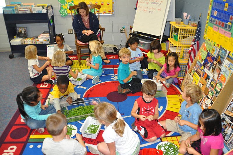 Children snapped green beans as part of the festivities. Photo submitted by Therese Rickrode.