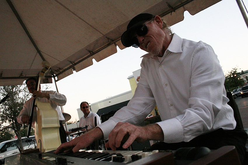 Keyboardist Mike Henley displayed impressive chops during Hot Item's performance at Music on Main.
