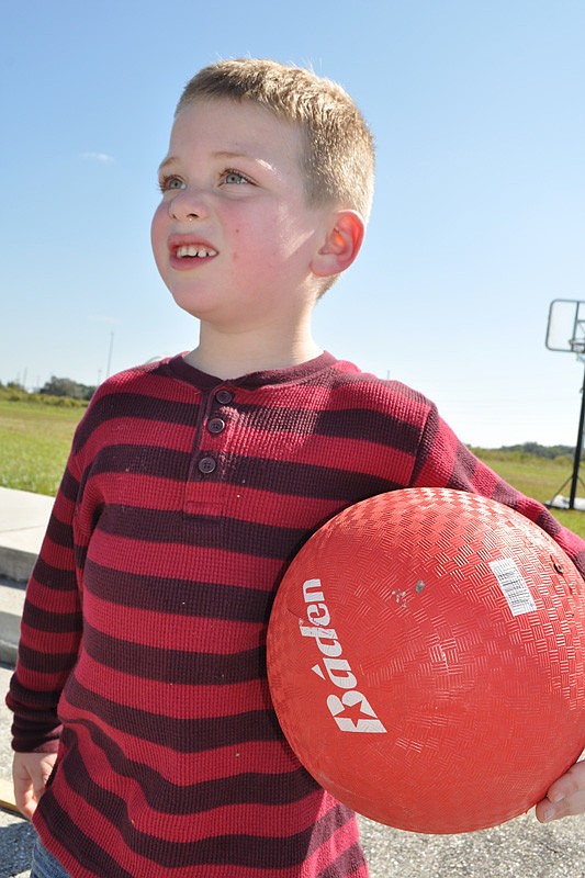 Zachary Grede, 4, had fun bowling with a friend.