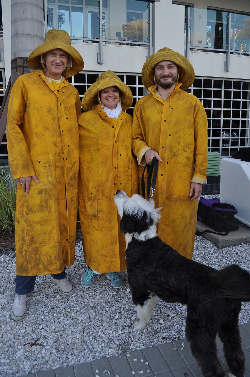 Ringling Museum Sponsors Grady Enlow, Pam Fendt, David Berry and Calypso the dog. Grady Enlow captained an opti in the race.