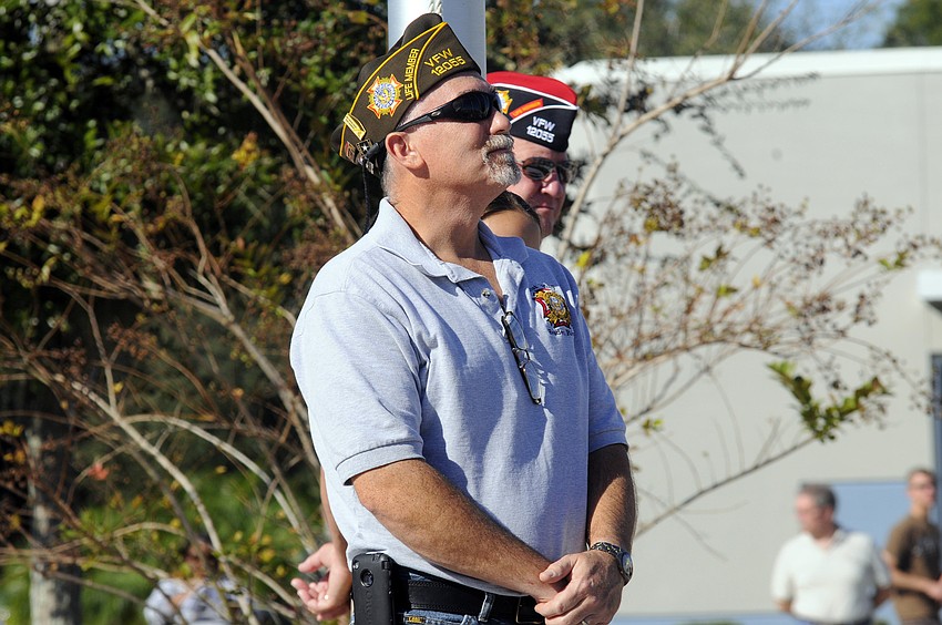 VFW Post 12055 Commander Dave Dailey watches as each branch of the military is recognized.