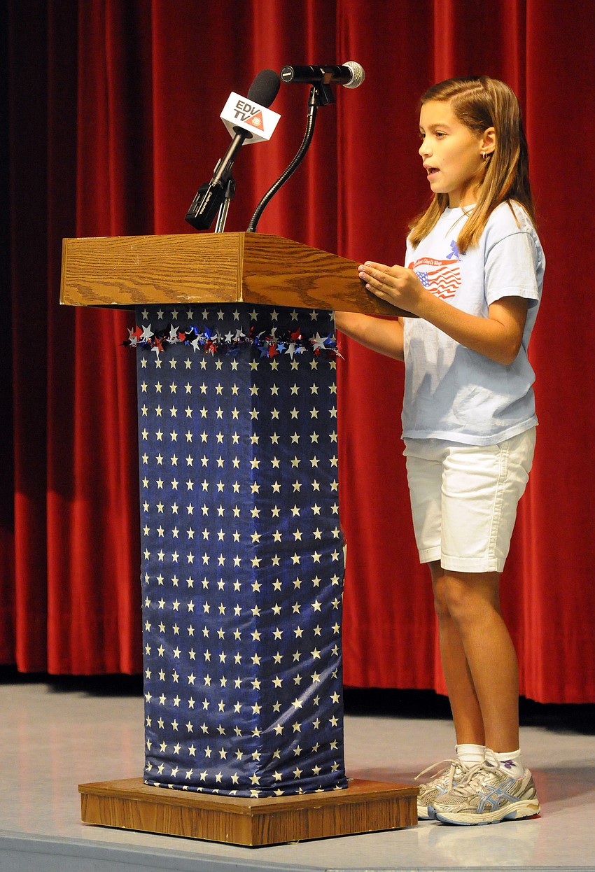 Fifth-grader Francesca Aluise shared the history of the Let Freedom Ring Courtyard.