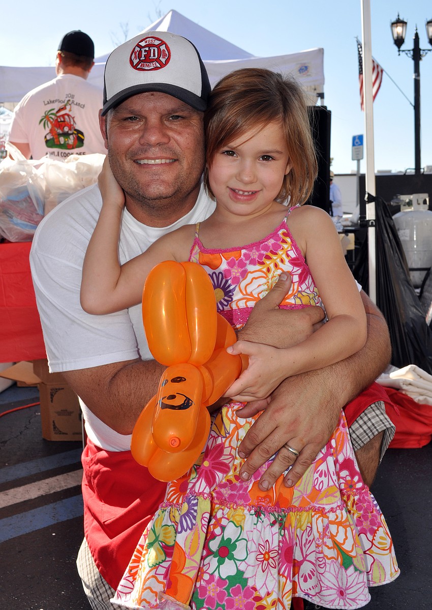 Six-year-old Molly Dillon is proud of her father, Ben Dillon, because â€œhe helps people.â€