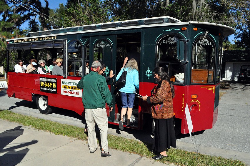 People make their way onto the trolley for a two-hour tour of the historic sites around Sarasota. The narrator of the tour was Sue Blue.