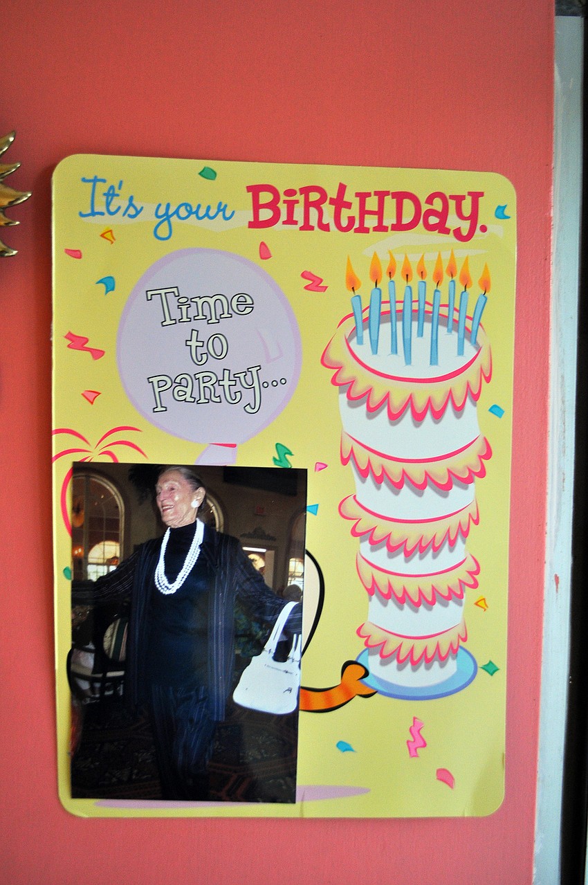 A fun birthday sign with a photo of Ursula Person was on the front door of Lesser's home.