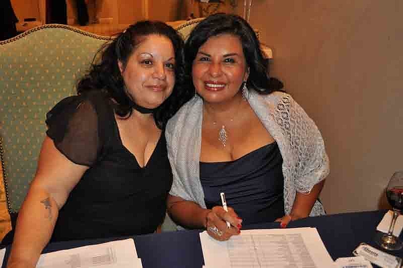 Cynthia Mejias and Elizabeth Anzellini checked in guests.