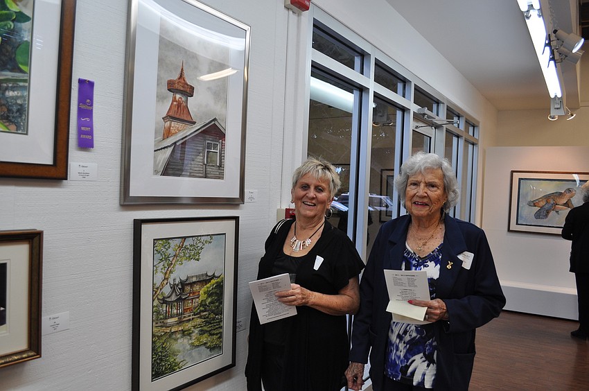 Dee Pastoris and Shirley Beachum in front of Dee Pastorisâ€™ piece 