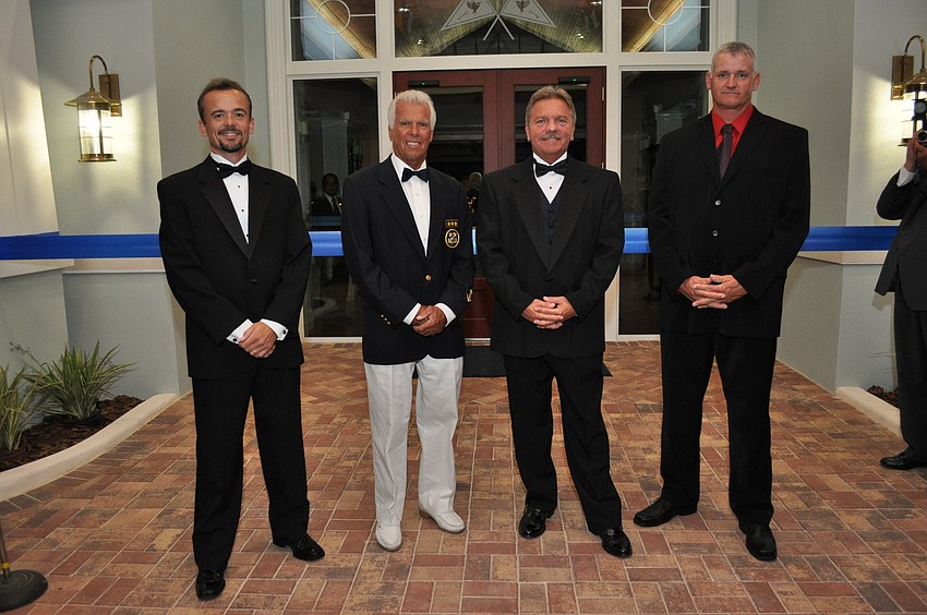 Contractor Steve Murray, Commodore Bob Baime, General Manager Rob Edwards, and Site Superintendent Andy Behrend.