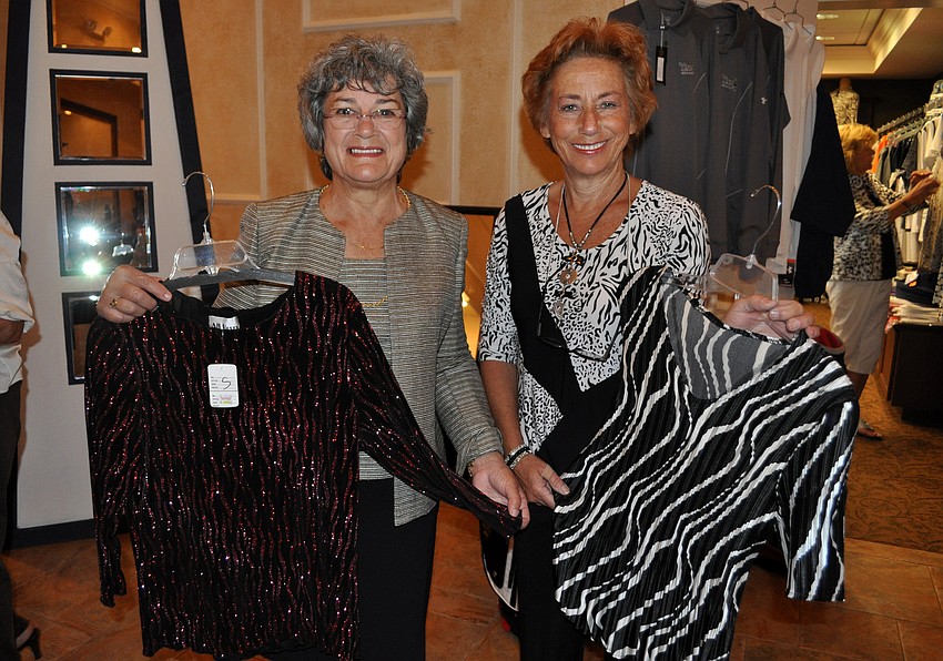 Tara resident Demi Kavis and Aâ€™ Tu International sales associate Betty Lorenzo display some of this yearâ€™s fashions.