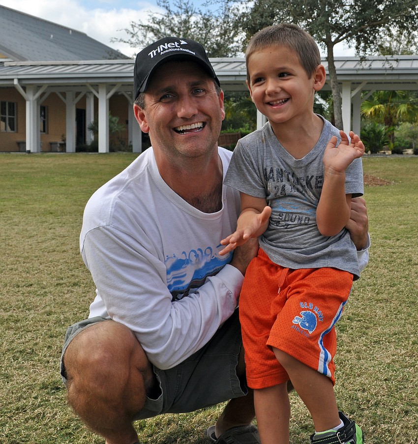 Peter Geaglone and his 3-year-old son Michael thoroughly enjoyed the event.