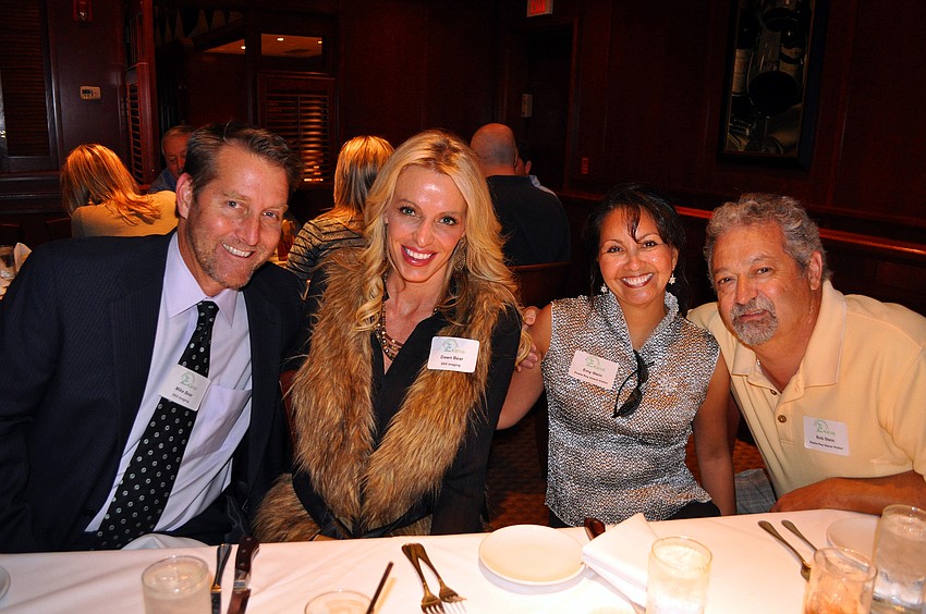 Mike and Dawn Bear sat with Emy and Bob Stein