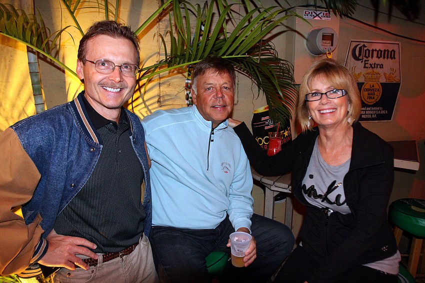 Fred Jung poses with Larry and Sara Myers