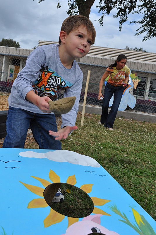 Devin DiCarlo, 6, made playing corn hole look easy.